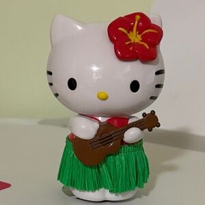 Sanrio Hello Kitty Hula Dancer Doll Car Dashboard Ornament.